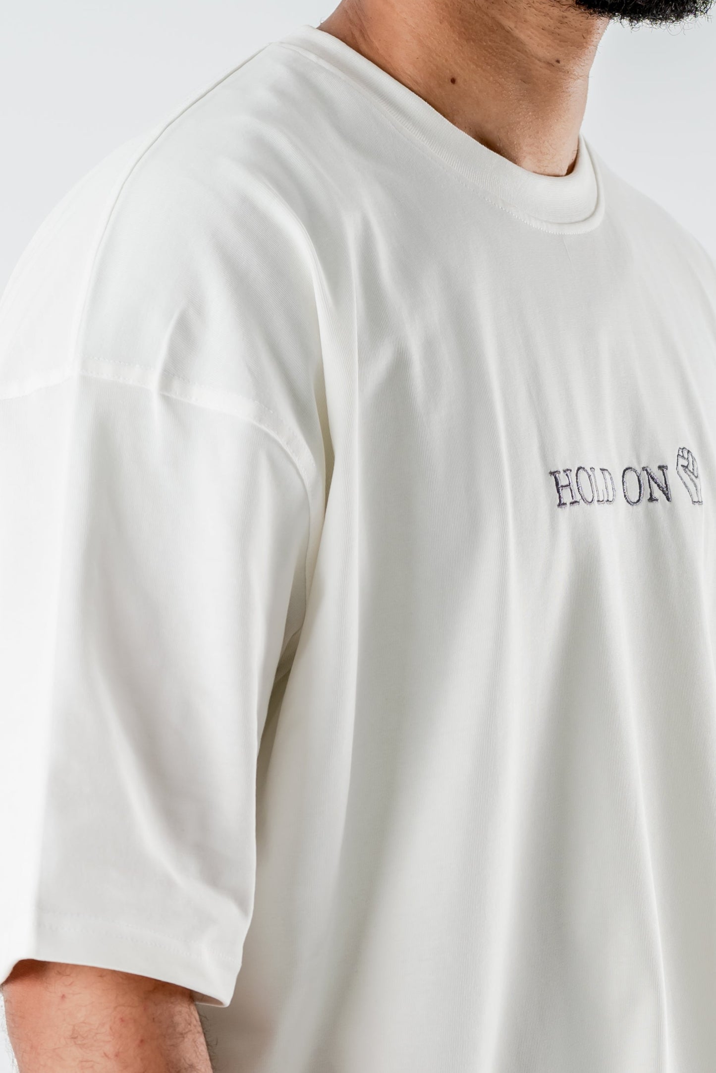 Oversized T-Shirt – “HOLD ON” Embroidered Design (White)